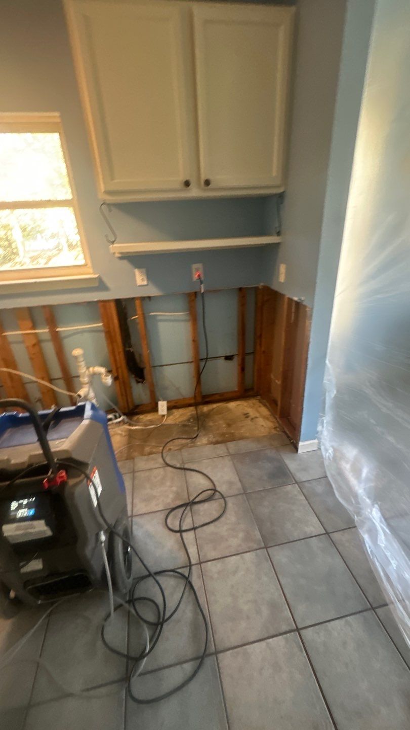 Water damage in Atlanta GA leaking pipes in kitchen repair