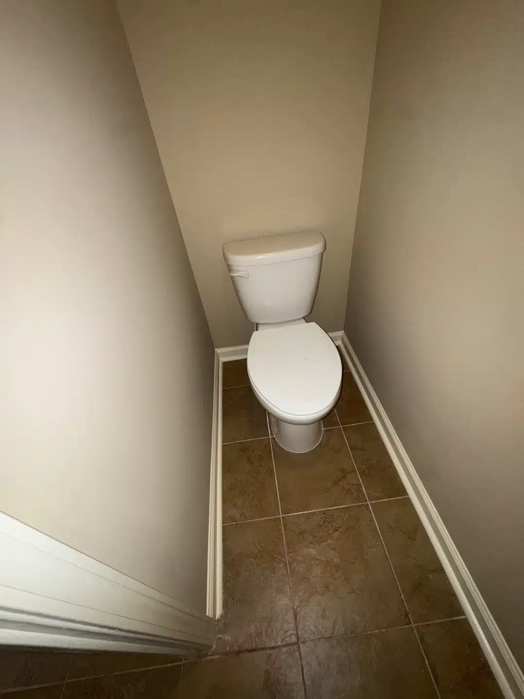 Finished powder room after water damage reconstruction in a Peachtree Corners home