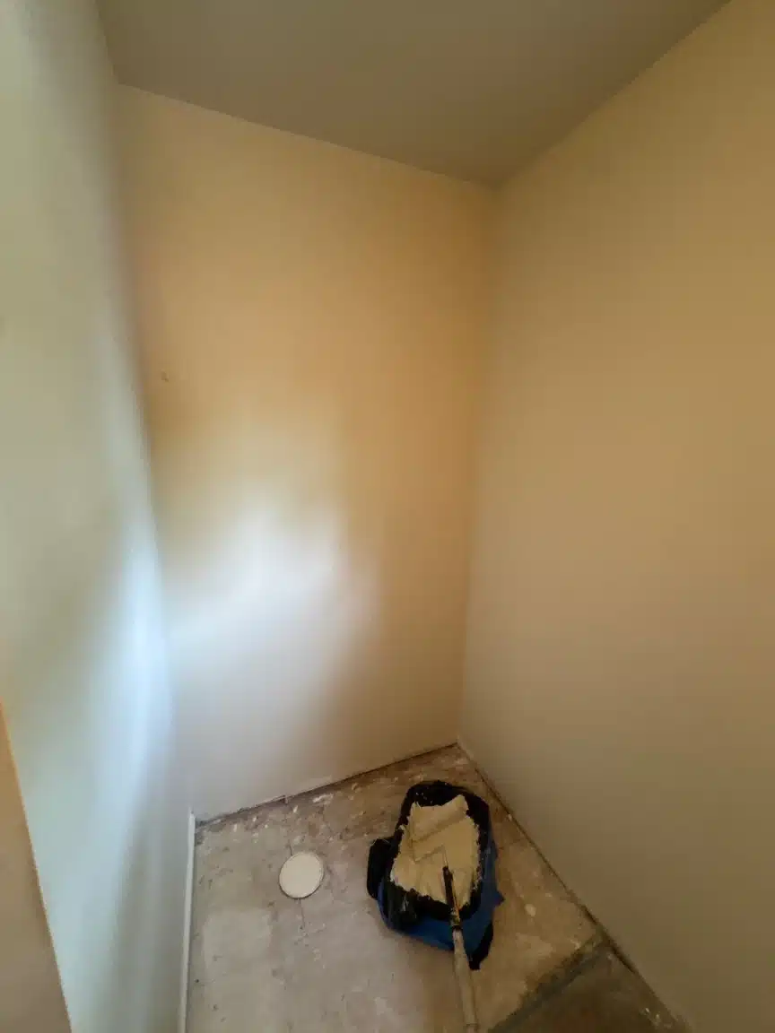 Master closet stripped back after affected material was removed