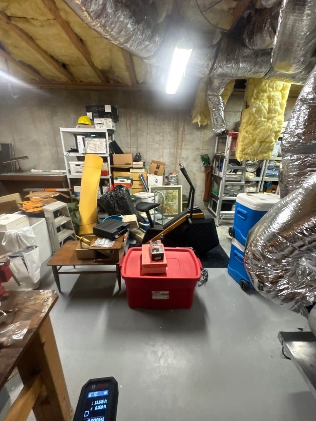 A lower-level space affected by a combined sewer backup in an older Atlanta home