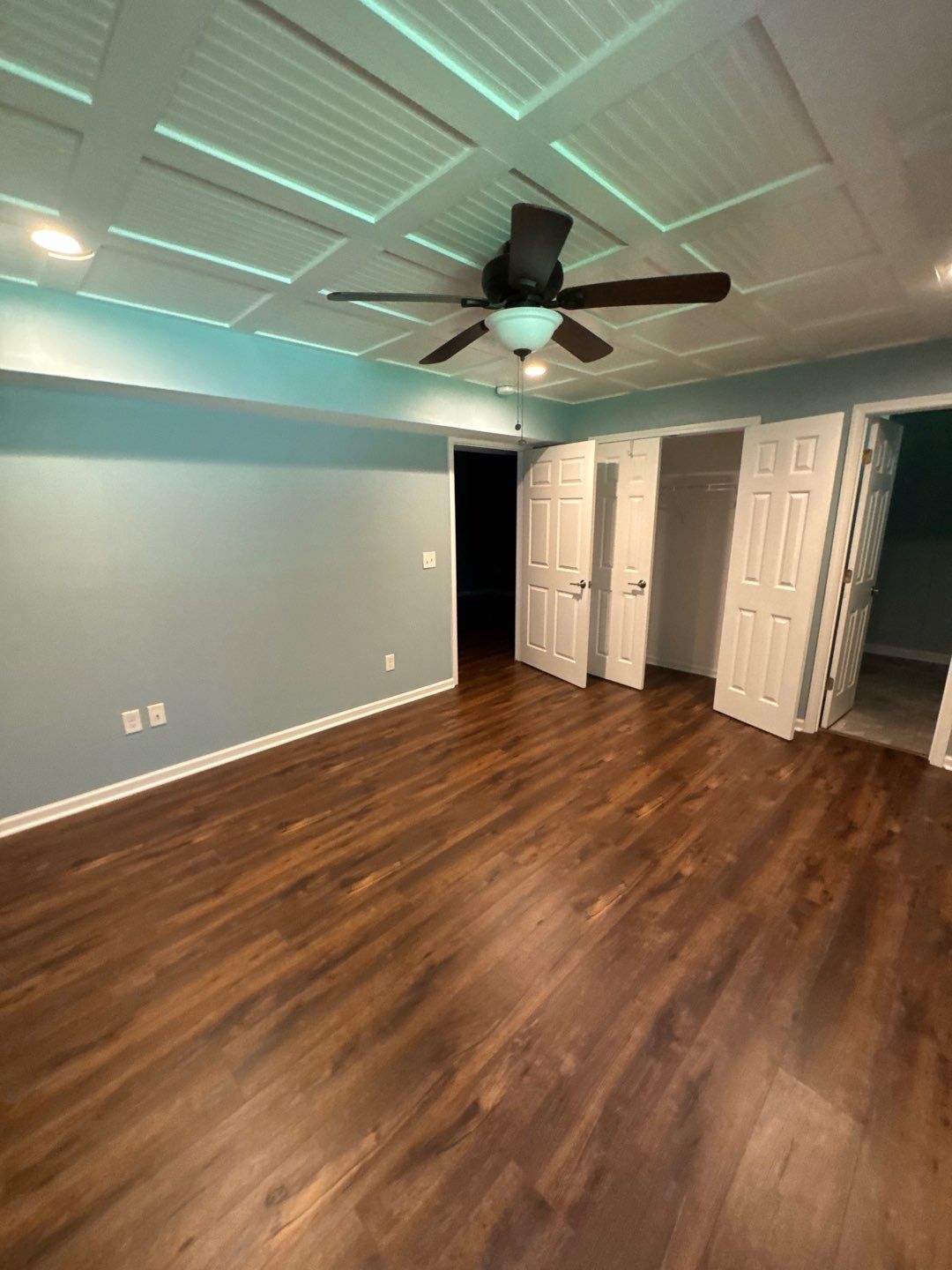 Contaminated floodwater and the flood line left on drywall and flooring