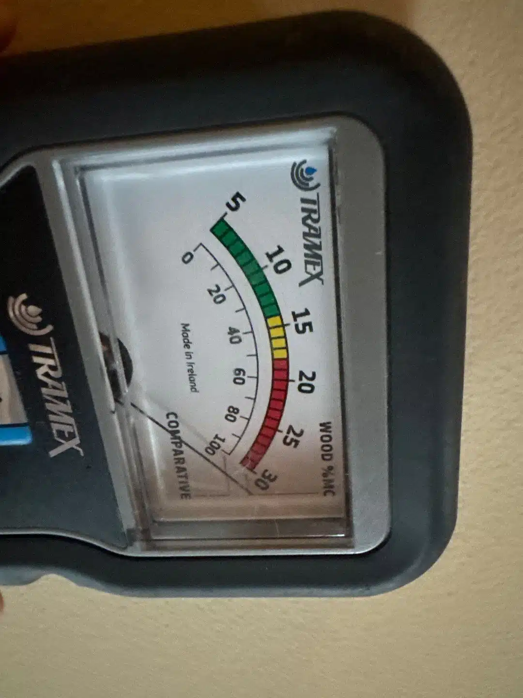 Moisture meter reading taken to confirm the thermal scan before any demolition