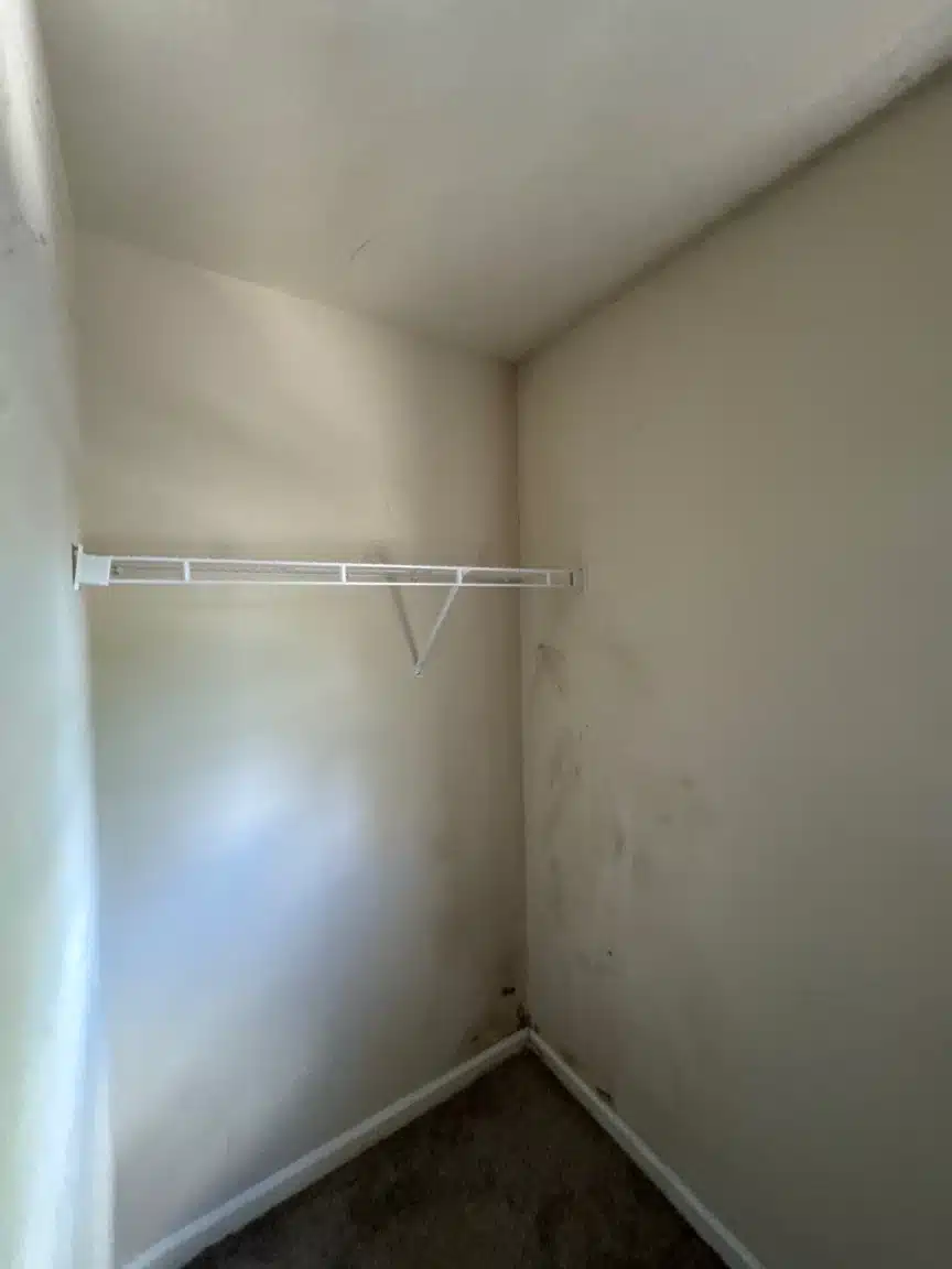 Finished master closet after reconstruction, with no visible patch line